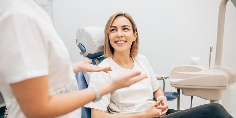 Patient consulting with dentist at Perfect Smiles Dentistry